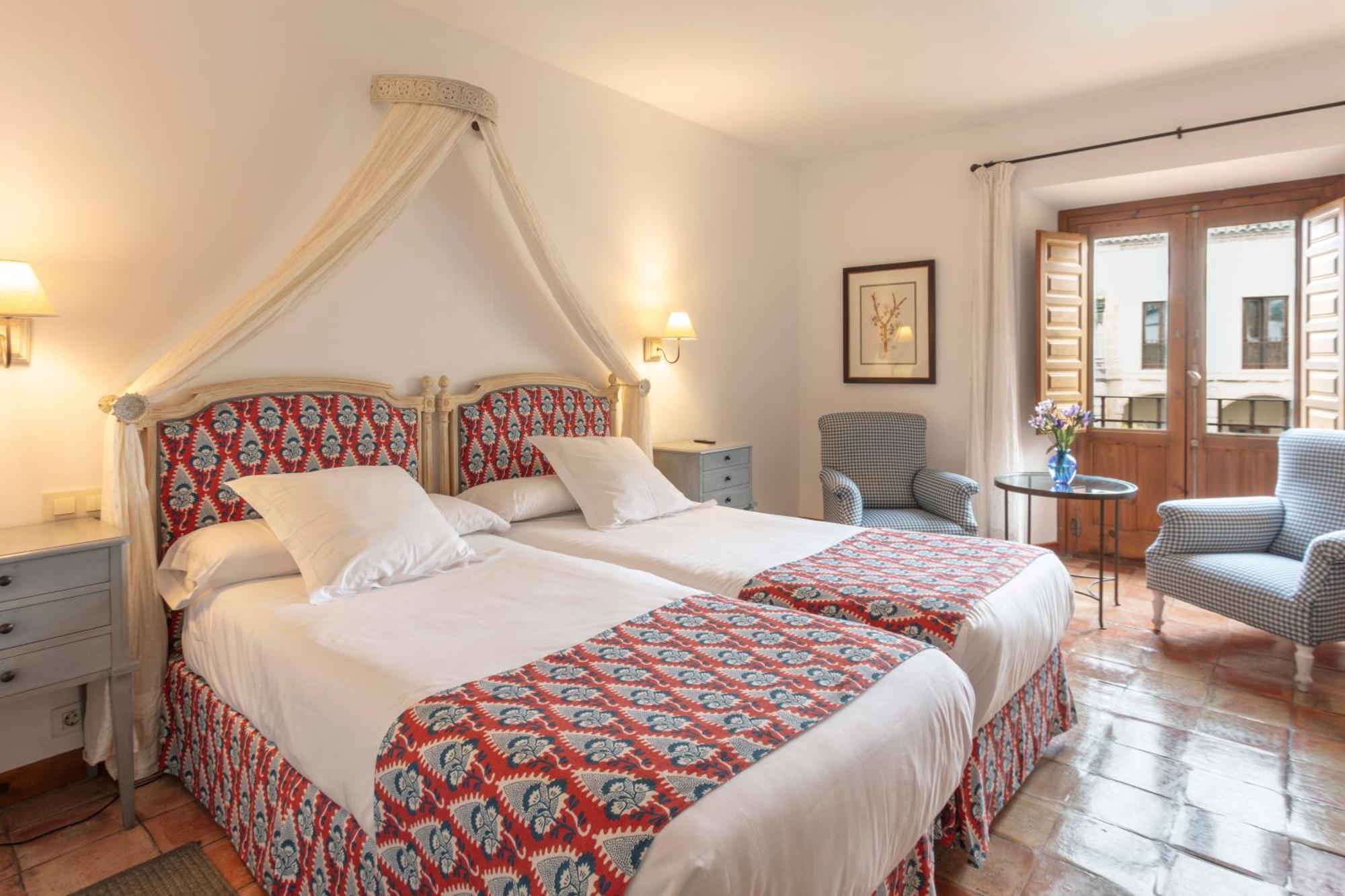 Hotel Puerta De La Luna Baeza Bagian luar foto